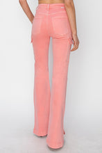 Back view showing pocket placement and bootcut leg of RISEN jeans