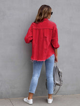 Back view of model wearing a deep red CloudKitten Distressed Drop Shoulder Denim Jacket, showcasing soft distressing and classic back yoke detail.