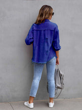Back view of model wearing a royal blue CloudKitten Distressed Drop Shoulder Denim Jacket, highlighting back panel seaming and drop shoulder detail.