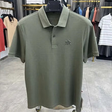 TexturaLoom Men’s Embossed Letter Polo Army Green Front View on Hanger.