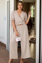 Model styled in Seerophant Ruffle Lounge Duo dust storm at mansion event
