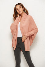 Close-up of Blush Pink SeraphinaWing Cardigan, highlighting soft knit fabric and delicate stitching.