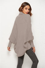 Back view of woman in Dust Storm SeraphinaWing Cardigan, showcasing relaxed drape and flowy batwing sleeves.