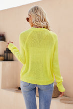 Back view of a woman wearing the Solavelle V-Neck Cardigan in banana yellow, highlighting its soft fabric and clean, seamless finish.