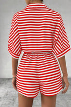Back view of LineaVerra™ Strawberry Striped Romper with tie waist and collared neck.