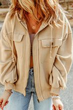 Side view of model wearing a tan Nivora™ DriftZip Hoodie with drawstring hood, zip-up front, and smooth side profile.