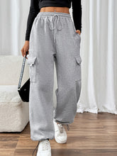 Front view of TaviraFlex™ Cargo Drawstring Joggers on model