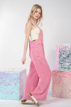 Model in profile wearing VERY J Texture Washed Wide Leg Overalls paired with a ribbed crop top, highlighting the side pocket details and textured fabric.