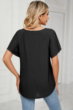 Zoomed-in back view of the cropped short sleeve Veluretta Mistflair Blouse in black.