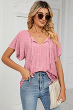 Veluretta Mistflair Blouse in carnation pink worn under a blazer for casual workday chic.