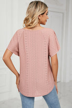 Back view of cropped short sleeve Veluretta Mistflair Blouse in peach.