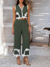 Model in Moss Xyvello set posing in heels.