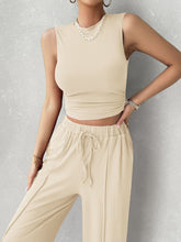 Close up front view of tan Zenvara set highlighting mock neck top, premium polyester/elastane blend fabric, and adjustable elastic waist detail