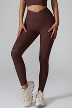front view women's active leggings in brown