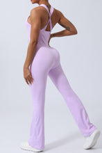 Back view of blush pink AerisCross Vivanta Jumpsuit highlighting strap detail and smooth back fit.