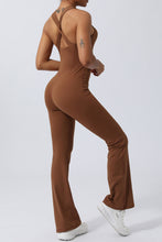 Back view of brown AerisCross Vivanta Jumpsuit highlighting strap detail and smooth back fit.