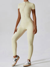 Close-up of half‑zip neckline and fabric texture on Light Yellow FlowFit Jumpsuit.