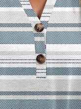 Close-up of half button-up and button  detail onAir Force Blue Printed Short Sleeve Blouse.