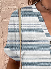 Close-up of the design on the Air Force Blue Printed Notched Short Sleeve Blouse.