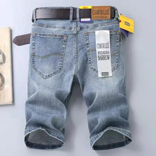 Men's air force blue vintage wash stretch denim bermuda shorts back view.