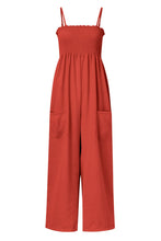 A front photo of a Red-Orange Smocked Amphitrite's Flow Wide Leg Jumpsuit with a white background.