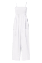A front photo of a white Smocked Amphitrite's Flow Wide Leg Jumpsuit with a white background.