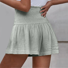 Gray pleated high elastic waist textured shorts back view.