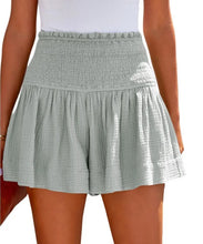Gray pleated high elastic waist textured shorts front view.