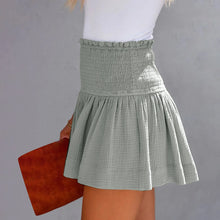 Gray pleated high elastic waist textured shorts side angle.