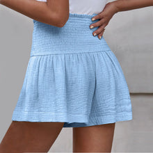 Sky blue pleated high elastic waist textured shorts side angle.
