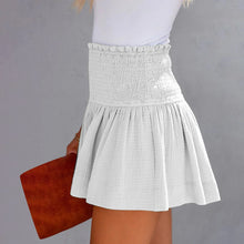 White pleated high elastic waist textured shorts side angle.