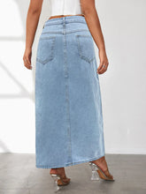 Back view of Averlynn Curve Skirt in light blue showing classic pockets and seam details