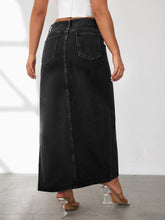 Back view of Averlynn Curve Skirt in black showing classic pockets and seam details