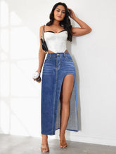 Full body view of model pose in dark blue Averlynn Curve Skirt styled holding a coffee cup