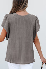 Back view displaying overall design and texture of the gray RuffleRidge Blouse.