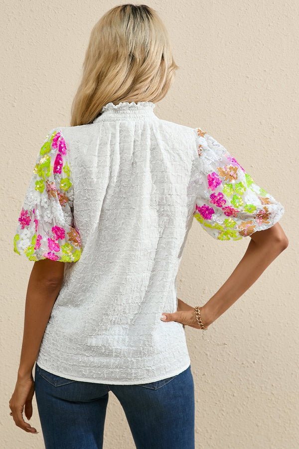 Back view displaying the smooth finish and overall fit of the LustruBloom Blouse.