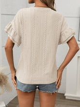 Back view of the Contrast Round Neck Short Sleeve Blouse in Beige, showing relaxed fit and contrast neckline detail.