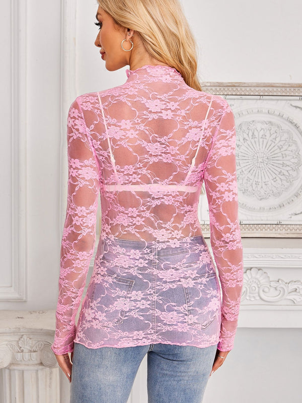 Back view of the Mock Neck Long Sleeve Lace Sheer Top in blush pink, highlighting delicate floral lace and button keyhole closure at the neck.