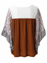 Back view of the BlossomEase Blouse in caramel, featuring floral three-quarter sleeves and soft cotton blend.