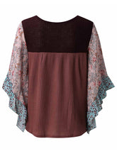 Back view of the BlossomEase Blouse in dusty pink, featuring floral three-quarter sleeves and soft cotton blend.
