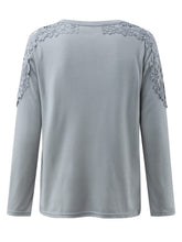 Back view illustrating the tee's overall fit and finish.