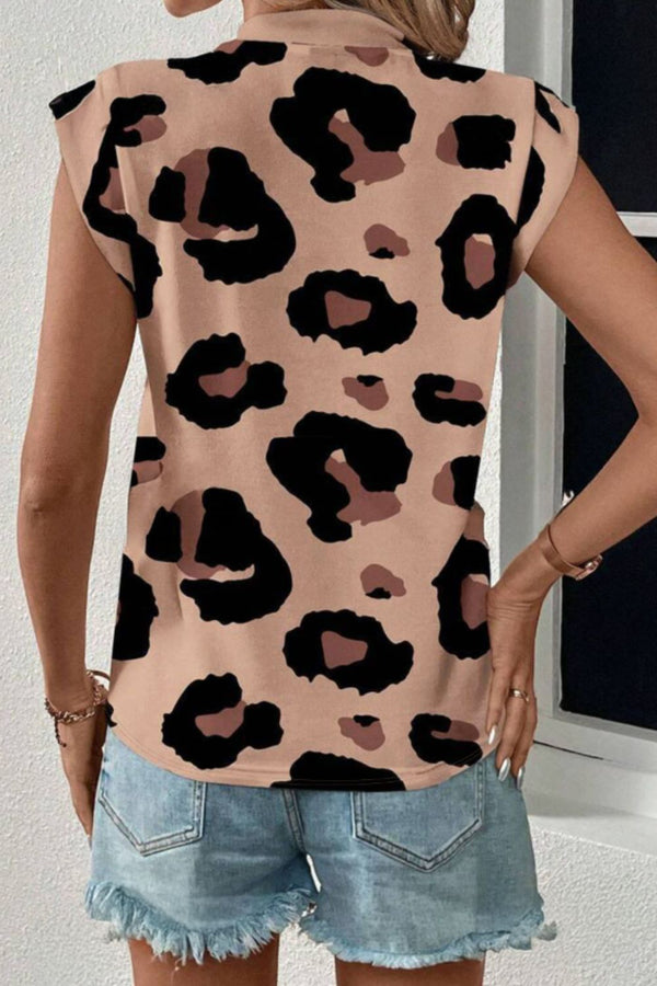 Back view of the leopard print T-shirt showing a clean, seamless design with cap sleeves and relaxed fit.