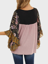 Back view of BlossomEase Blouse in moonlit mauve showing shoulder seams and fabric drape.