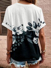 Back view of black floral Printed Notched Short Sleeve Blouse with loose silhouette