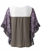 Back view of the BlossomEase Blouse in lavender, featuring floral three-quarter sleeves and soft cotton blend.
