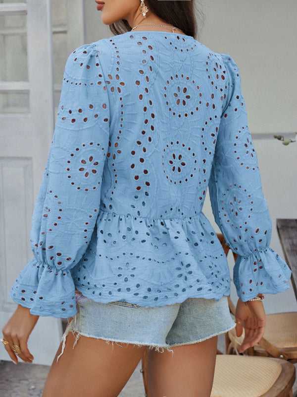 Back view showcasing round neckline of the light blue PeplumMuse™ Blouse on a model paired with light washed jean shorts, jewelry, and heels.