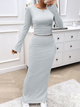 Front view detailed shot of Bayline Striped Harmony Set in light gray boat neck top and skirt fabric