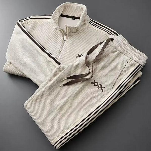 beige auralyss elite stripe zip jacket and pants set front folded view