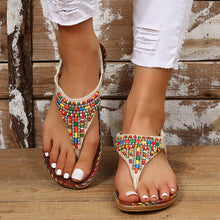 Model wearing a beige pair of PU Leather Beaded Flat Sandals
