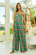 BiBi Multi-Color Plaid Overalls styled for streetwear with chunky sunglasses and a crossbody bag.